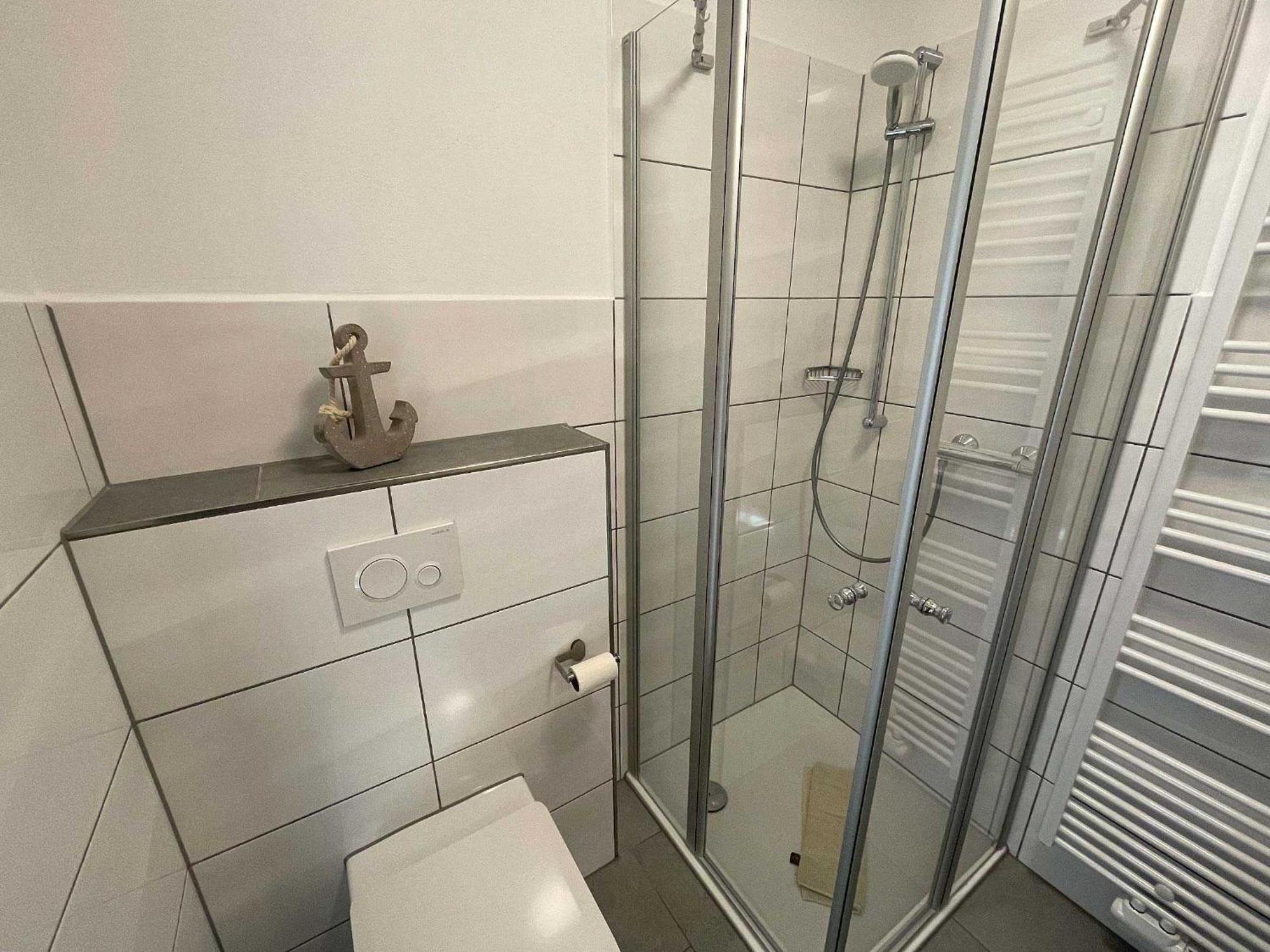 Haus "An Der Kurpromenade" Appartement Harlesiel Buitenkant foto